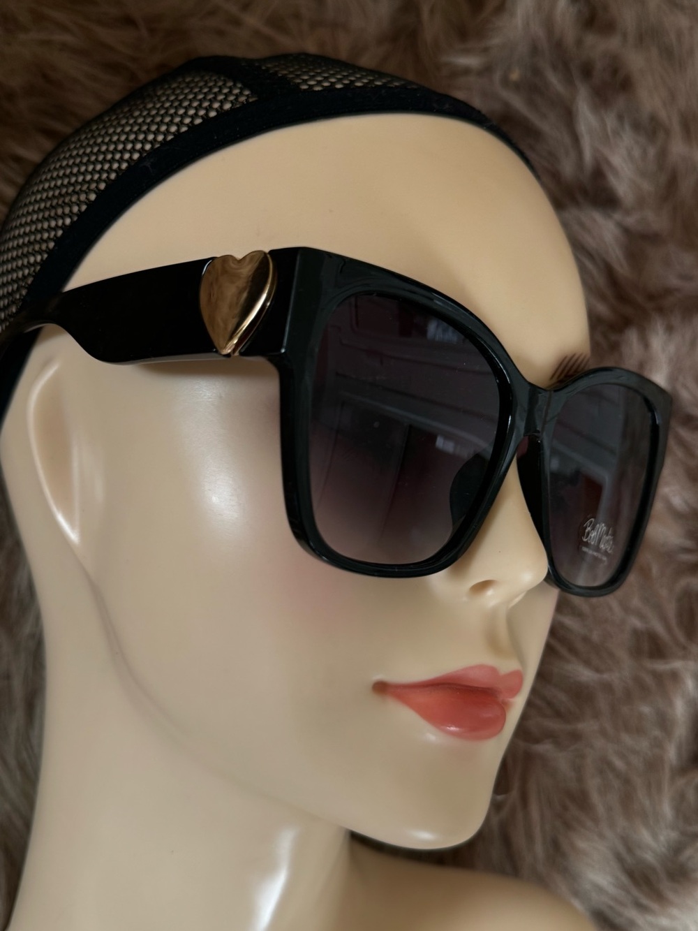Futuristic cat eye sunglasses with gold heart ok sides bob mackie